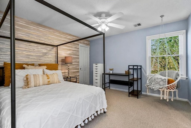 bedroom featuring baseboards, carpet, and ceiling fan