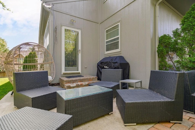 view of patio / terrace with an outdoor living space and area for grilling