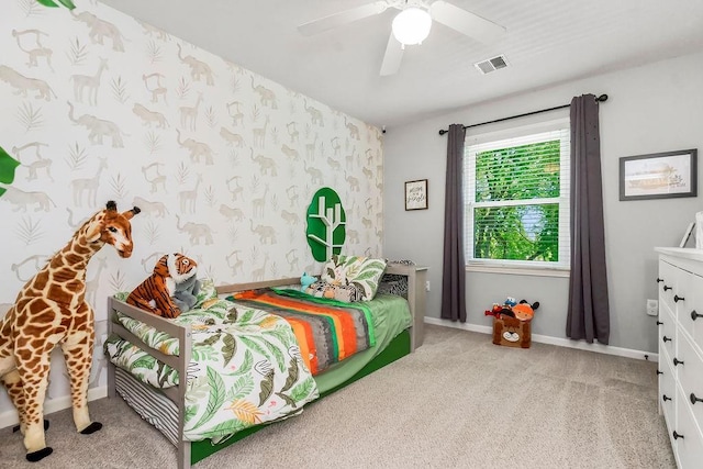 14327 King St, Overland Park, KS 66221 - carpeted bedroom with ceiling fan and baseboards
