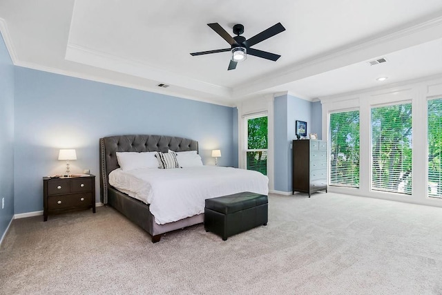 14327 King St, Overland Park, KS 66221 - bedroom featuring ornamental molding, carpet flooring, a tray ceiling, a ceiling fan, and baseboards