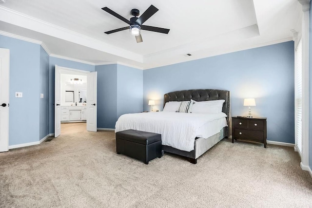 14327 King St, Overland Park, KS 66221 - carpeted bedroom with baseboards, a raised ceiling, crown molding, and ensuite bathroom