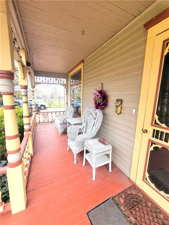 deck with covered porch