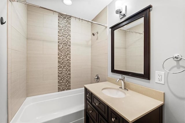 bathroom featuring shower / bathing tub combination and vanity