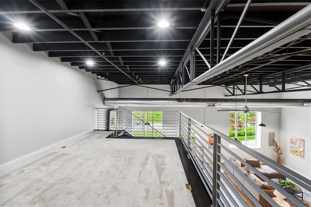 interior space featuring baseboards and a wealth of natural light