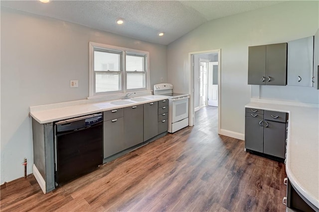 kitchen with white range with electric stovetop, vaulted ceiling, gray cabinetry, a sink, and dishwasher