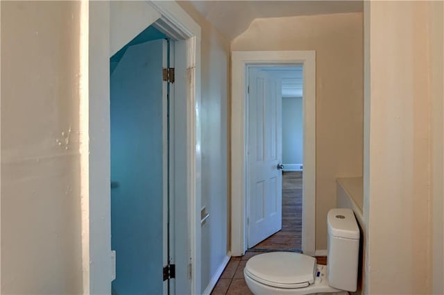 bathroom with tile patterned floors and toilet
