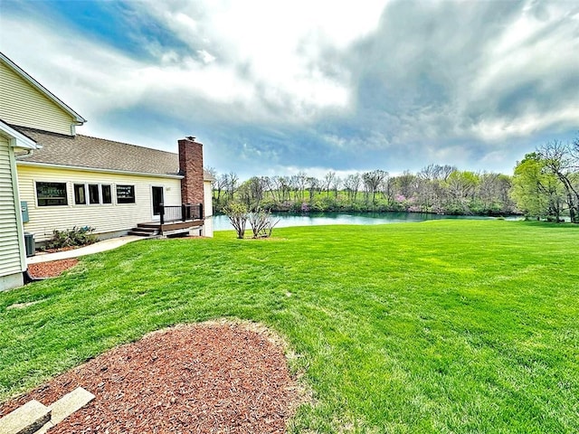 8225 NE 124th St, Kansas City, MO 64167 - view of yard featuring a water view