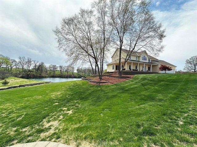 8225 NE 124th St, Kansas City, MO 64167 - view of yard featuring a water view