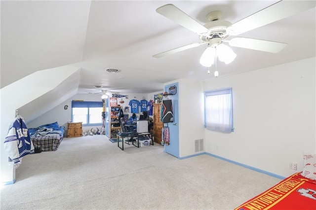 carpeted bedroom featuring visible vents, ceiling fan, and multiple windows