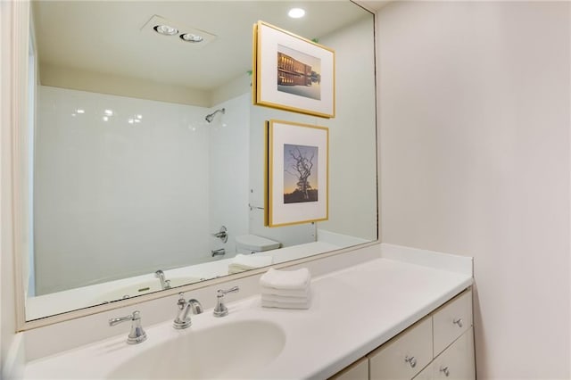 full bath featuring vanity and recessed lighting