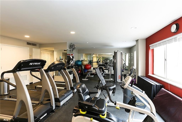 workout area with recessed lighting