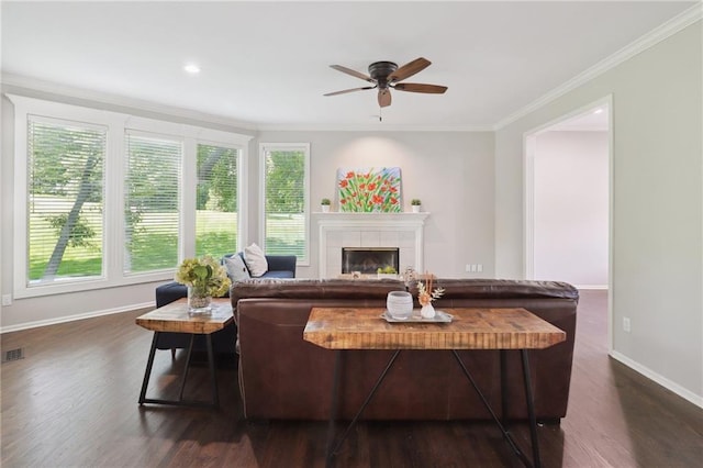 5329 Park St, Shawnee, KS 66216 - living area featuring plenty of natural light, baseboards, ceiling fan, dark wood-style floors, and crown molding