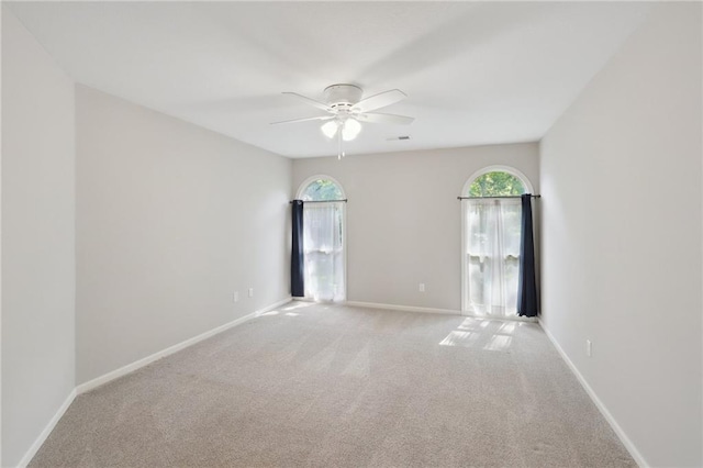 5329 Park St, Shawnee, KS 66216 - unfurnished room with ceiling fan, light carpet, and baseboards