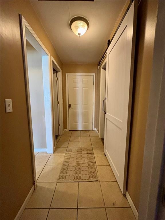 1519 Niagara St, Burlington, KS 66839 - corridor featuring light tile patterned flooring and baseboards