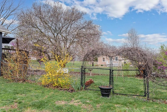 view of yard with a gate and fence