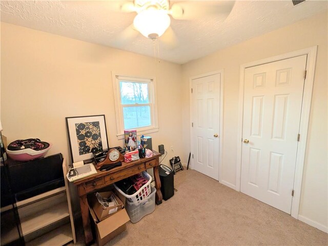 1804 S Phillips St, El Dorado Springs, MO 64744 - office area featuring carpet flooring, ceiling fan, and baseboards