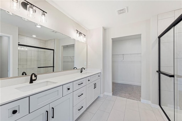 503 Woodview Dr, Raymore, MO 64083 - full bathroom with a stall shower, double vanity, baseboards, and a spacious closet