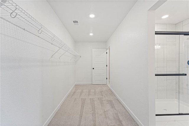 503 Woodview Dr, Raymore, MO 64083 - walk in closet featuring carpet floors