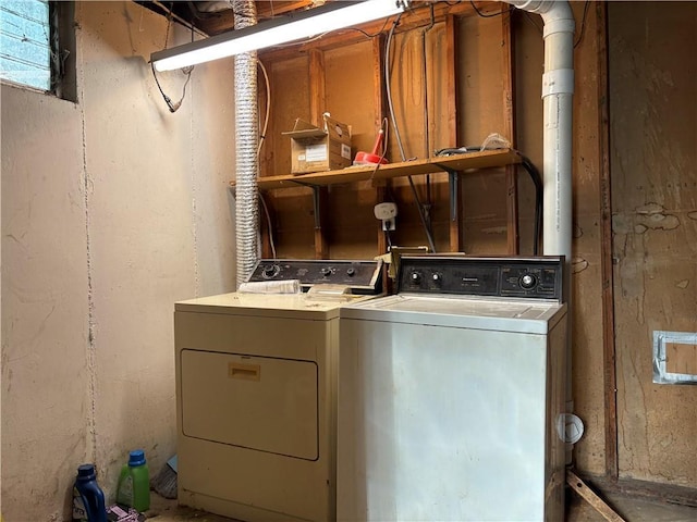 laundry room featuring laundry area and washer and clothes dryer