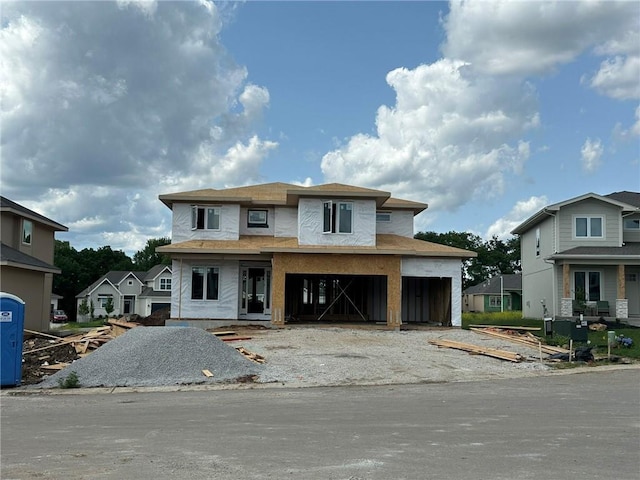 15438 W 171st Pl, Olathe, KS 66062 - view of front facade with a porch, driveway, and a garage