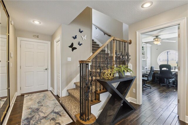 113 Lighthouse Pt, Gallatin, MO 64640 - foyer featuring stairway, a ceiling fan, wood finished floors, a textured ceiling, and baseboards