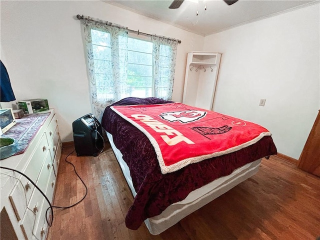 1124 Pacific Ave, Osawatomie, KS 66064 - bedroom featuring wood-type flooring and ceiling fan