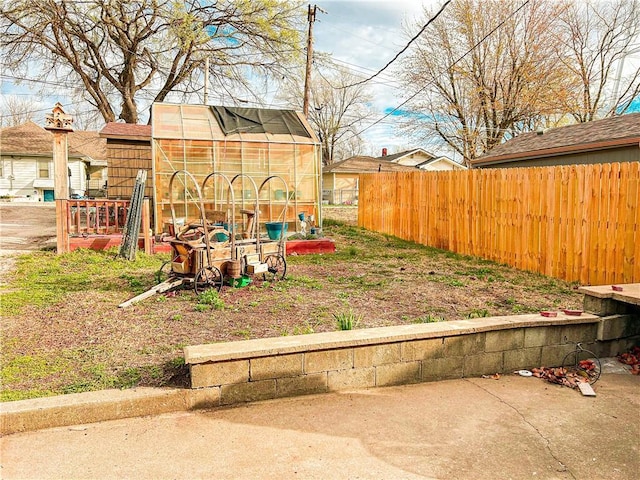 1124 Pacific Ave, Osawatomie, KS 66064 - view of yard with an exterior structure and an outdoor structure