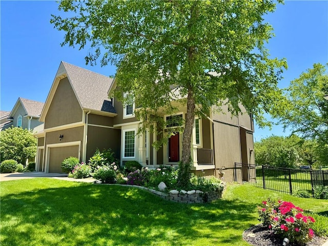 14413 Stearns St, Overland Park, KS 66211 - view of front of home with a garage and driveway