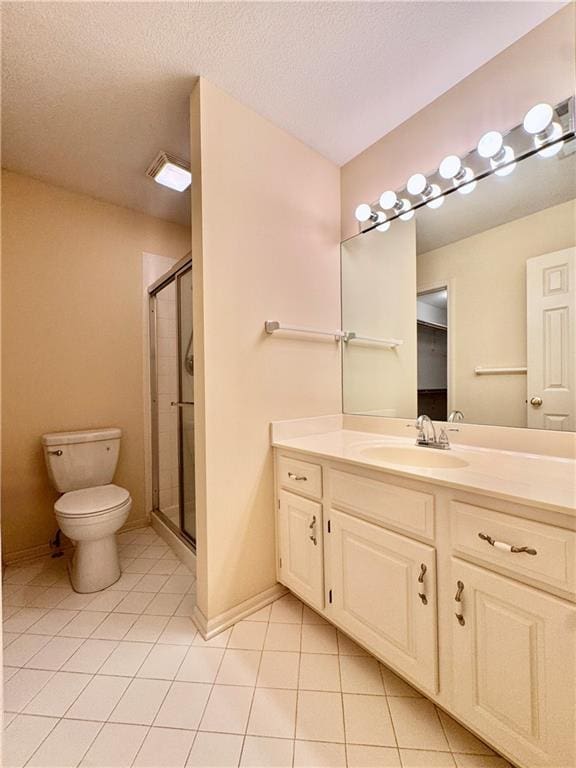 14413 Stearns St, Overland Park, KS 66211 - full bath featuring tile patterned flooring, vanity, a shower stall, and toilet