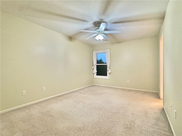 14413 Stearns St, Overland Park, KS 66211 - unfurnished room featuring a ceiling fan, light carpet, baseboards, and a textured ceiling