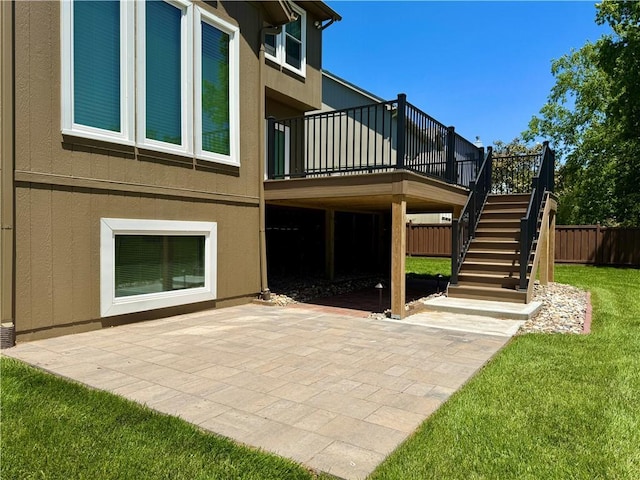14413 Stearns St, Overland Park, KS 66211 - back of house with a patio area, stairs, a wooden deck, and stucco siding