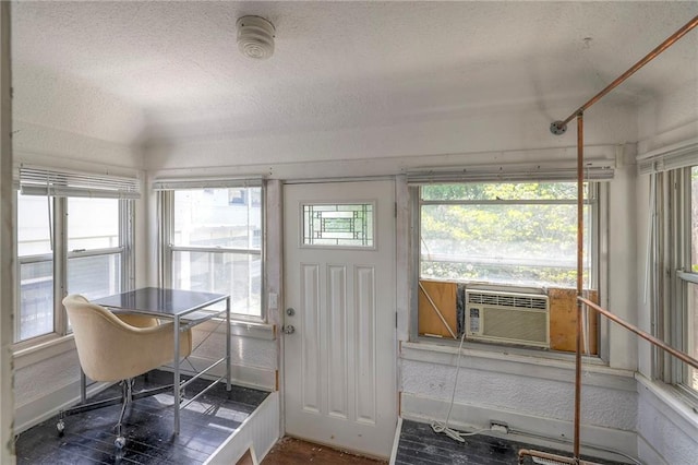 sunroom featuring cooling unit