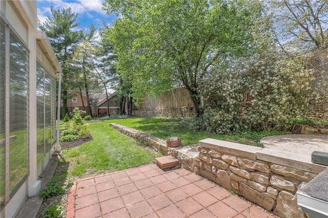 view of yard with a patio and a fenced backyard