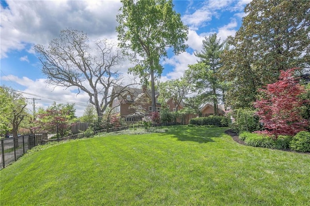 view of yard with fence