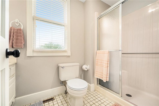 17014 NE 119th St, Kearney, MO 64060 - bathroom with a shower stall, baseboards, toilet, and tile patterned floors