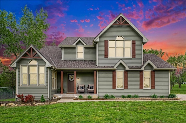 17014 NE 119th St, Kearney, MO 64060 - view of front of house featuring a porch, roof with shingles, and a front yard
