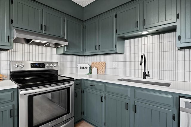 14875 Edgerton Rd, Gardner, KS 66030 - kitchen with stainless steel range with electric stovetop, under cabinet range hood, backsplash, and light countertops