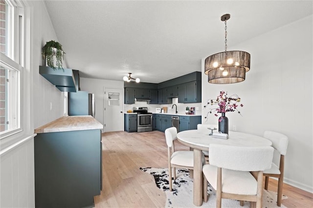 14875 Edgerton Rd, Gardner, KS 66030 - dining area featuring light wood-style flooring