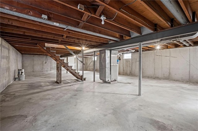14875 Edgerton Rd, Gardner, KS 66030 - unfinished below grade area featuring stairway and heating unit