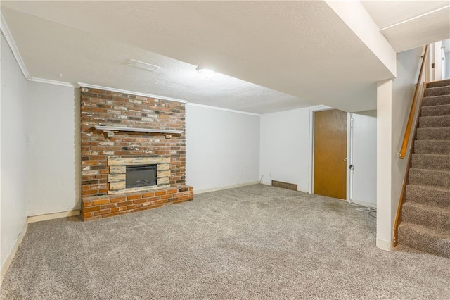 7201 E 130th Ter, Grandview, MO 64030 - unfurnished living room with stairway, carpet, a textured ceiling, a brick fireplace, and crown molding