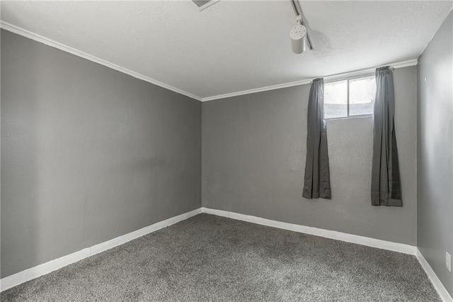 7201 E 130th Ter, Grandview, MO 64030 - empty room featuring a textured ceiling, dark colored carpet, and crown molding