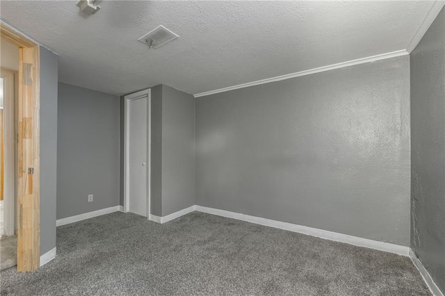7201 E 130th Ter, Grandview, MO 64030 - unfurnished room with carpet floors and a textured ceiling