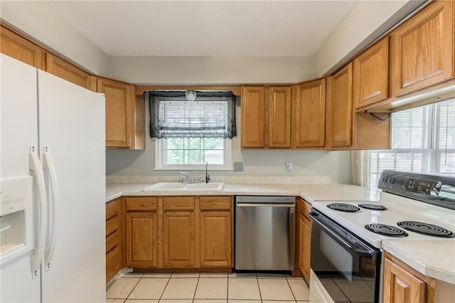 7201 E 130th Ter, Grandview, MO 64030 - kitchen featuring white fridge with ice dispenser, dishwasher, electric range, light countertops, and brown cabinetry
