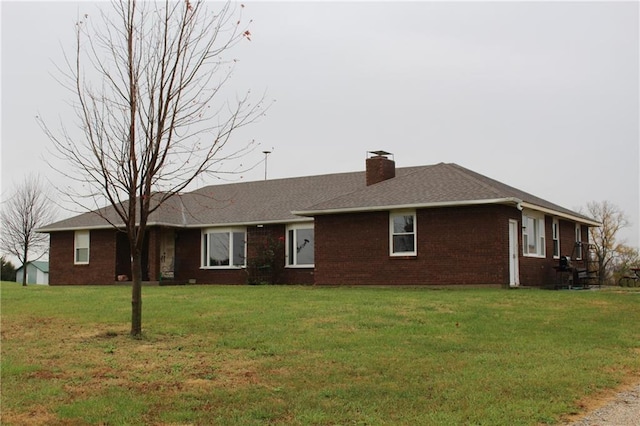 16468 K 16 Hwy, Oskaloosa, KS 66066 - single story home with brick siding, a chimney, a front lawn, and a shingled roof
