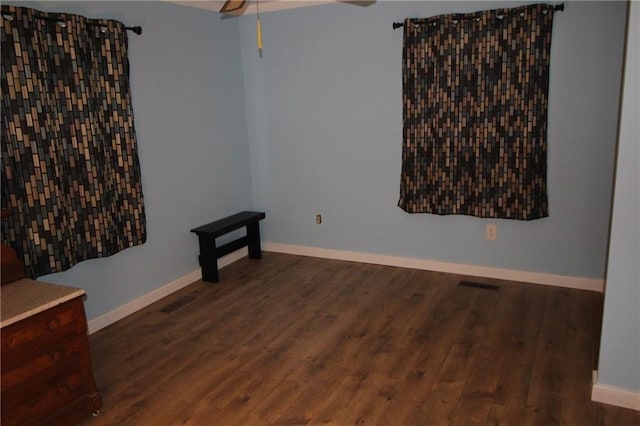 16468 K 16 Hwy, Oskaloosa, KS 66066 - unfurnished room featuring ceiling fan, wood finished floors, and baseboards