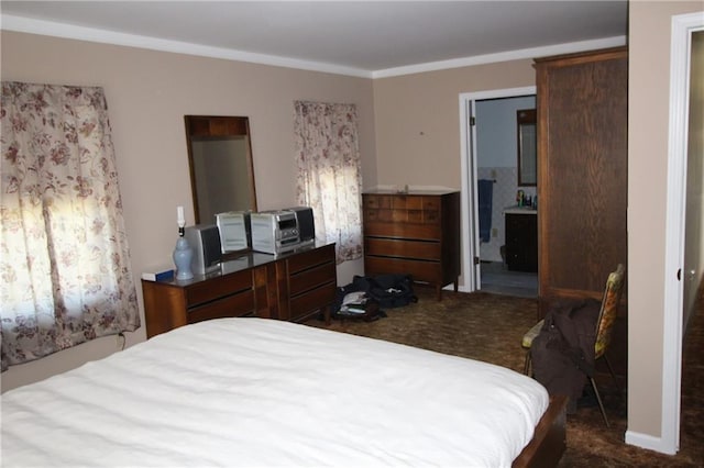 16468 K 16 Hwy, Oskaloosa, KS 66066 - bedroom with dark carpet, crown molding, and ensuite bathroom