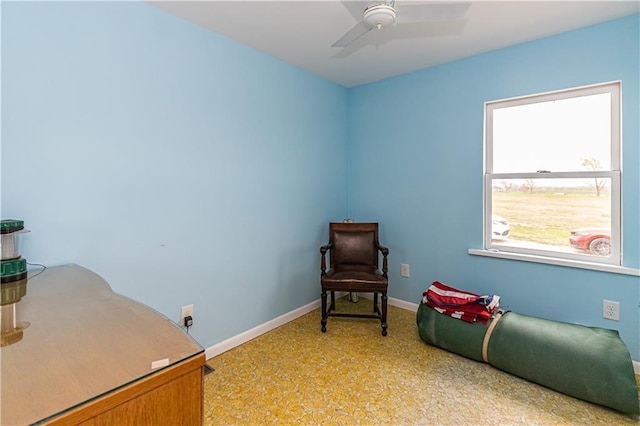 16468 K 16 Hwy, Oskaloosa, KS 66066 - sitting room featuring baseboards, ceiling fan, and dark speckled floor