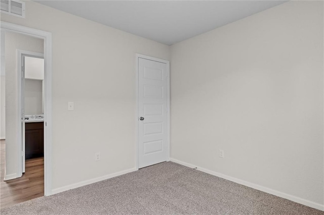 37854 W 207th Ter, Edgerton, KS 66021 - unfurnished bedroom with carpet flooring and baseboards