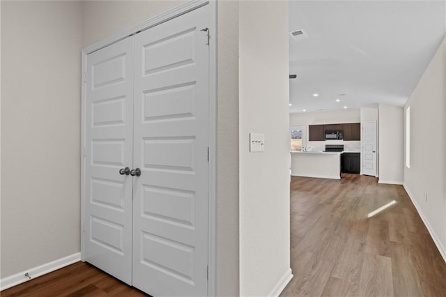 37854 W 207th Ter, Edgerton, KS 66021 - hallway with dark wood-type flooring and recessed lighting