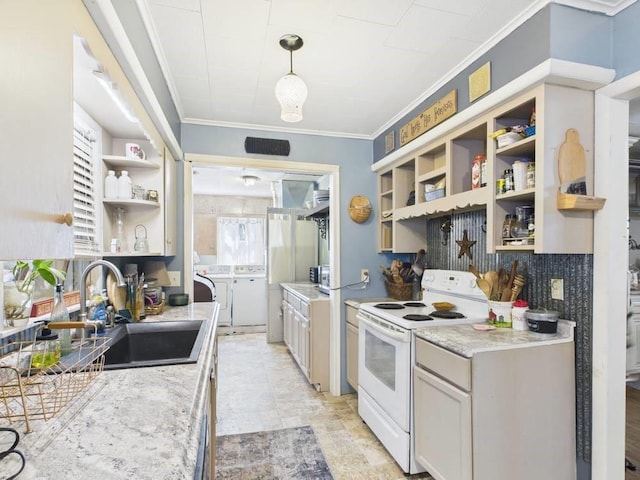 kitchen with independent washer and dryer, open shelves, a sink, ornamental molding, and white electric stove